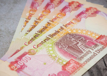 Positive and negative effects of removing zeros on the Iraqi dinar